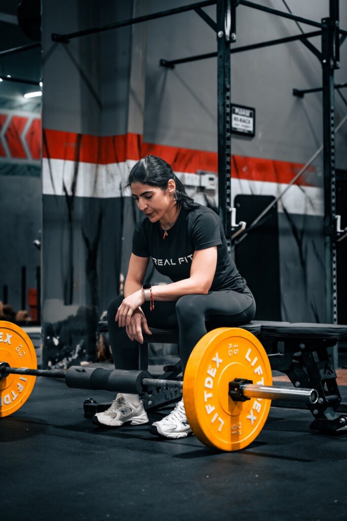 Woman training with a Real Fit coach